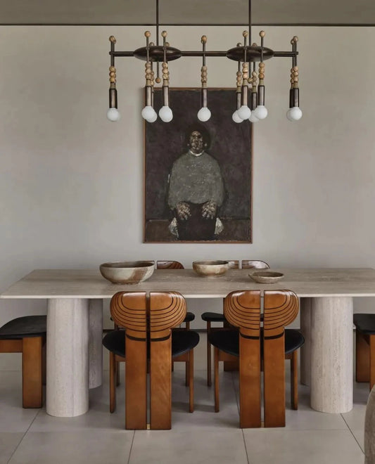 Side view of Talisman 14 Apparatus style chandelier with architectural form