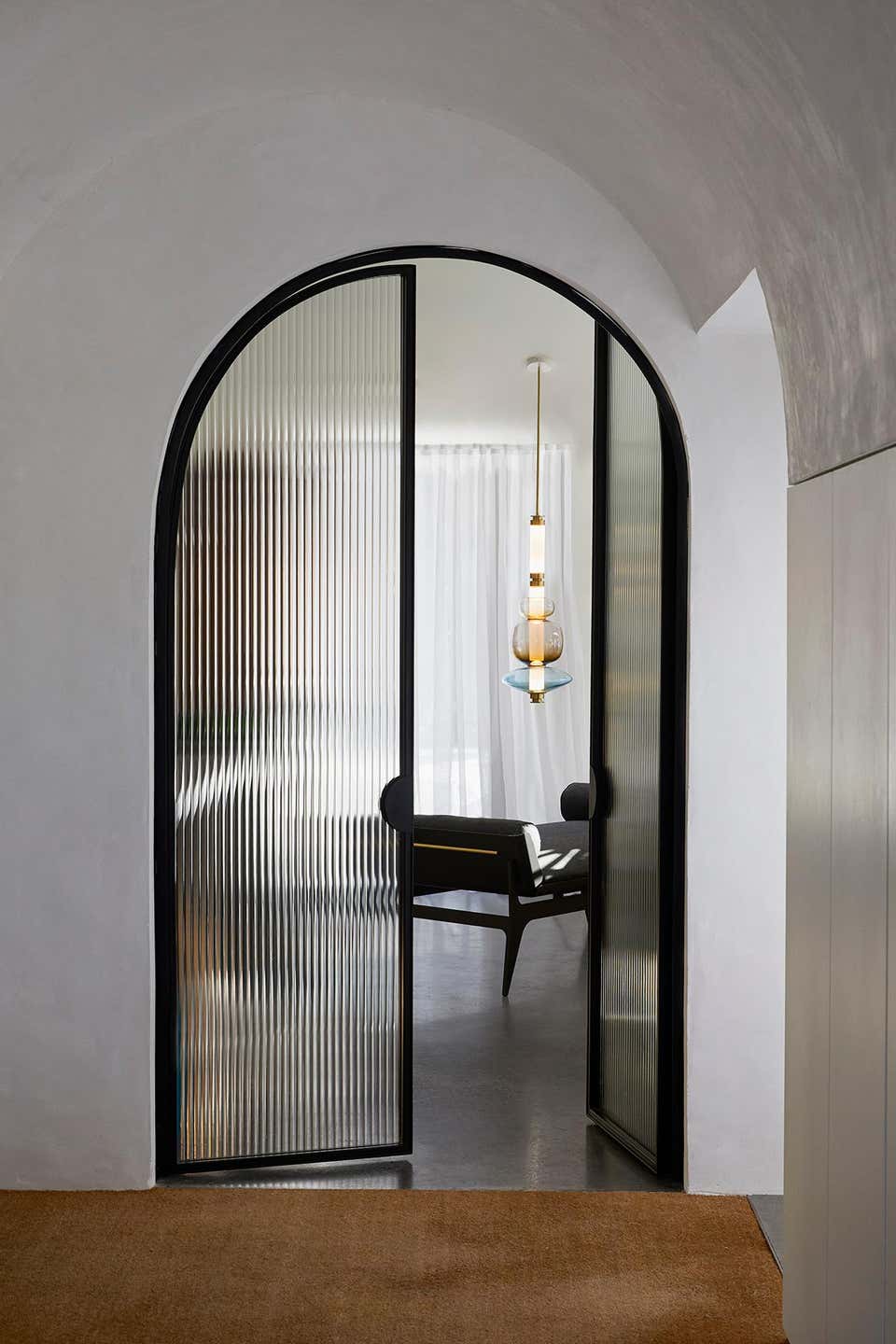 A luxurious Luna style glass pendant light with a gold and clear glass construction, designed for elegant room lighting.