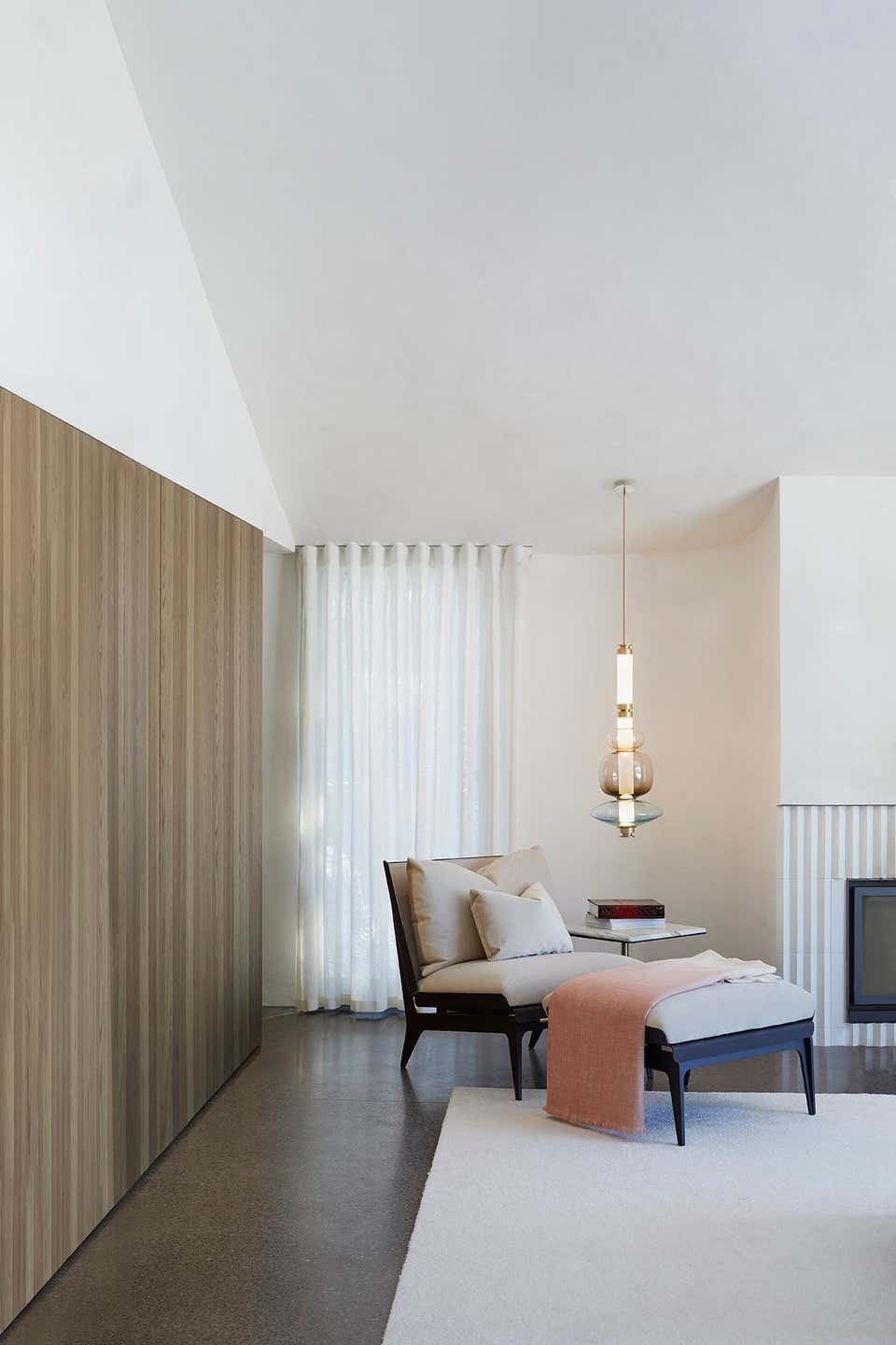 A luxurious Luna style glass pendant light with a gold and clear glass construction, designed for elegant room lighting.