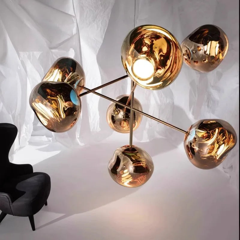 Melt style 7 head chandelier angled view showing organic molten pendant shapes
