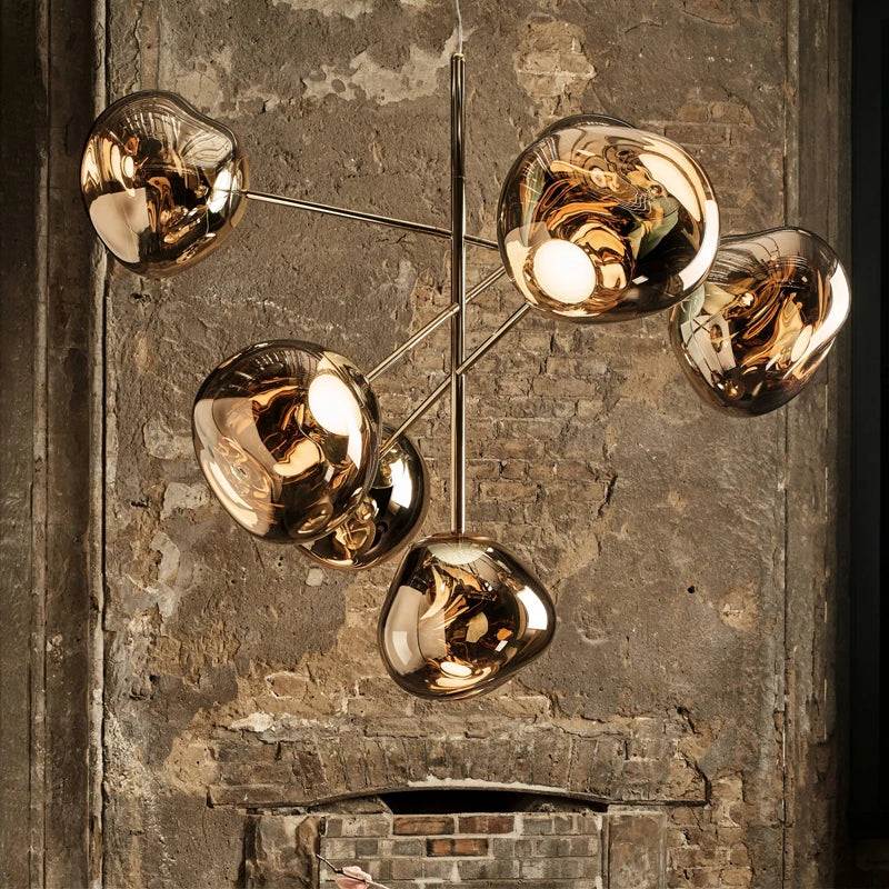 Melt style 7 head chandelier angled view showing organic molten pendant shapes
