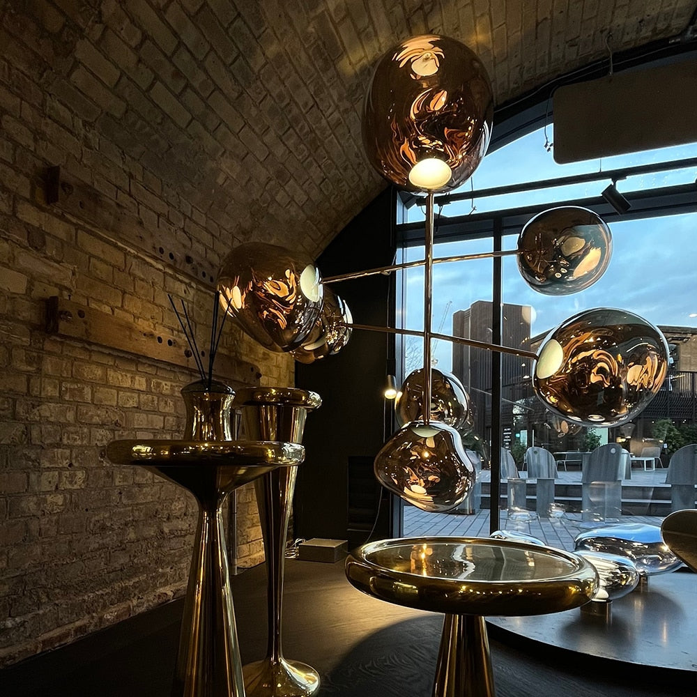 Melt style 7 head chandelier in modern living room statement lighting design
