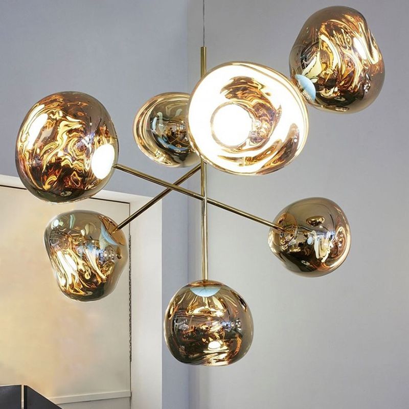 Close-up of melt style chandelier molten glass texture and reflective sculptural surface
