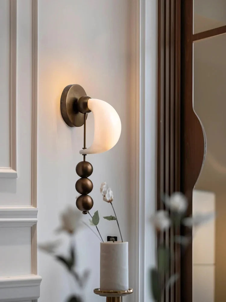 Close up of Patty style wall light showing elegant contemporary finish