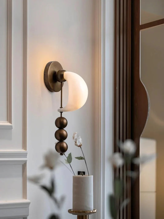 Close up of Patty style wall light showing elegant contemporary finish