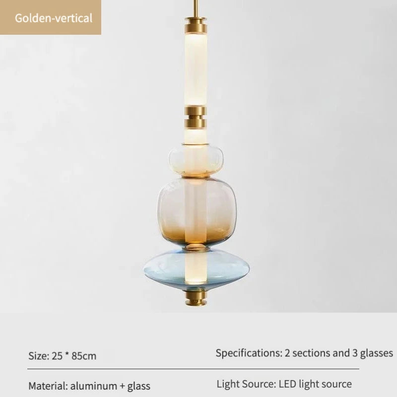 A luxurious Luna style glass pendant light with a gold and clear glass construction, designed for elegant room lighting.
