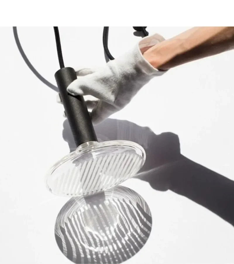 Close-up of Fractal M Style Chandelier crystal and metal details with warm ambient lighting
