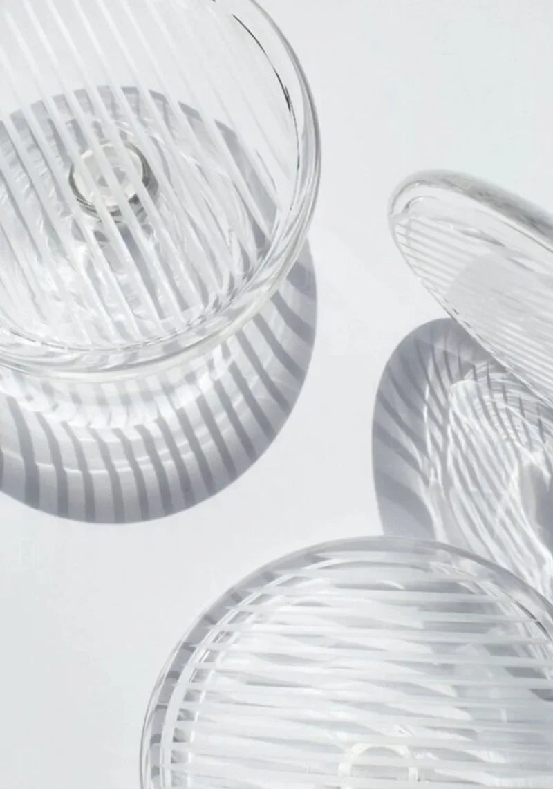 Close-up of Fractal L Style Chandelier crystal and metal details with warm ambient lighting