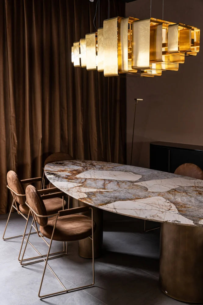 Baxter Lais pendant light above dining table