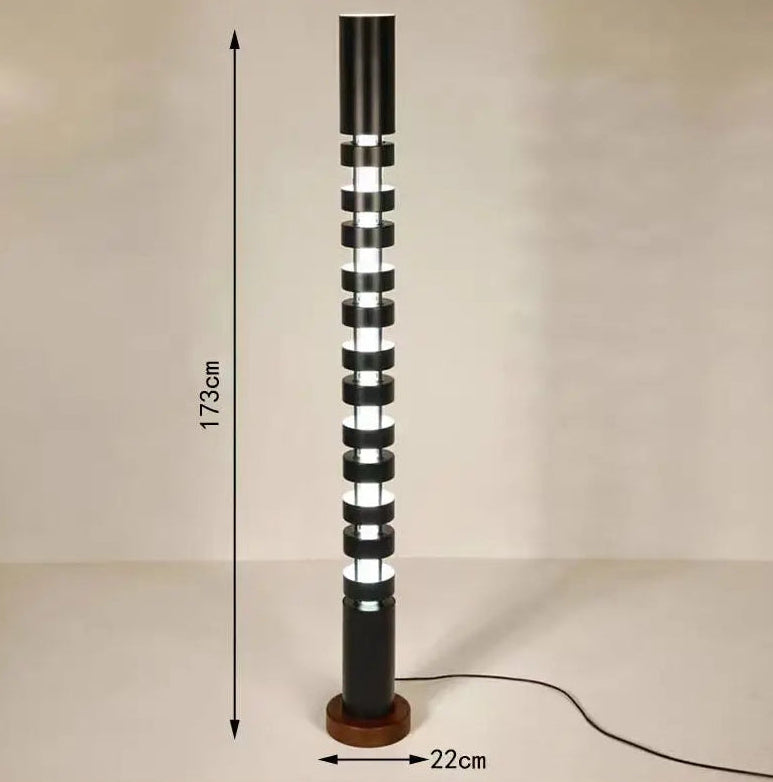 A black floor lamp with a cylindrical base and a segmented, illuminated column, shown with dimension markers indicating a height of 173cm and a base width of 22cm.