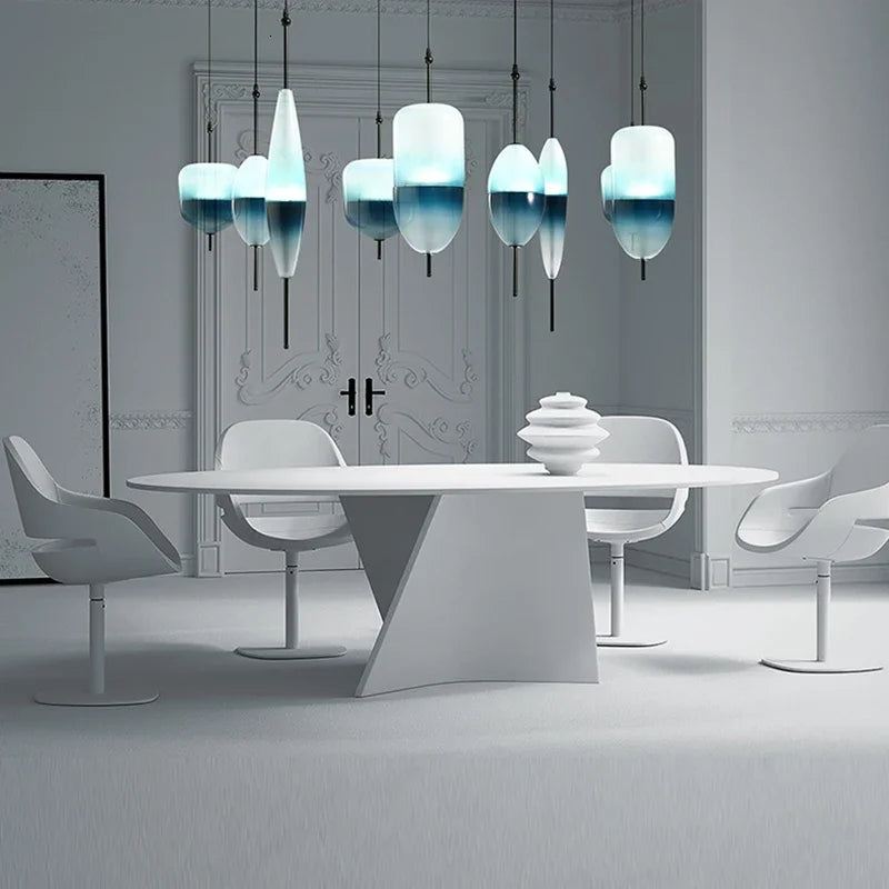 FLOW[T] S2 pendant light above dining table