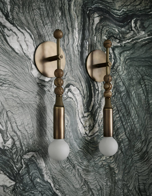 Pair of Talisman 1 sconce wall lights installed symmetrically on feature wall