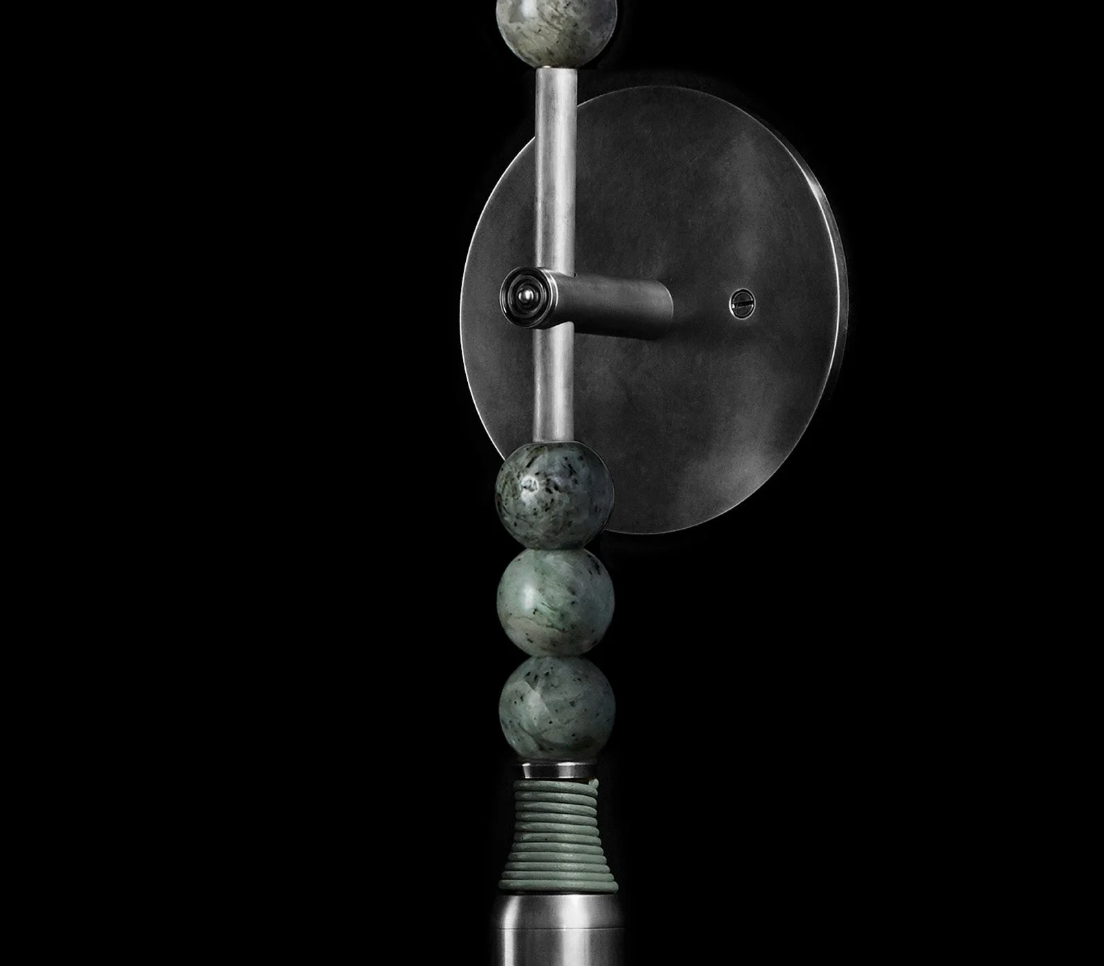 Close up of Talisman 1 sconce wall light showing sculptural design details