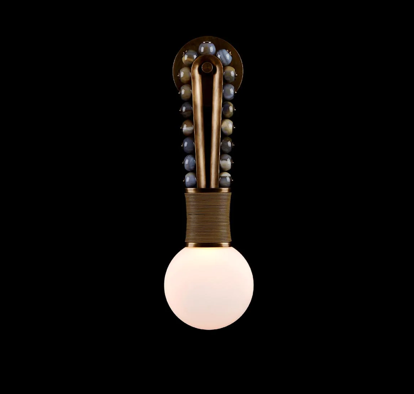 Close up of Talisman Loop style wall light showing looped sculptural design