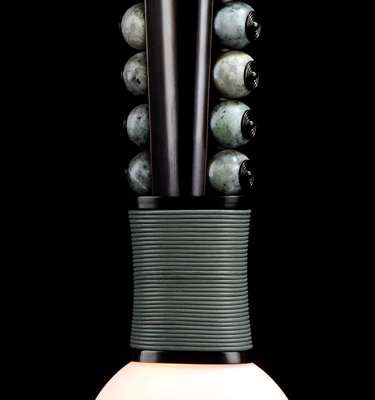 Close up of Talisman Loop style wall light showing looped sculptural design