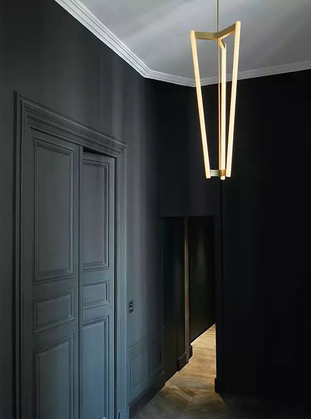 Side view of Tube chandelier with architectural linear composition