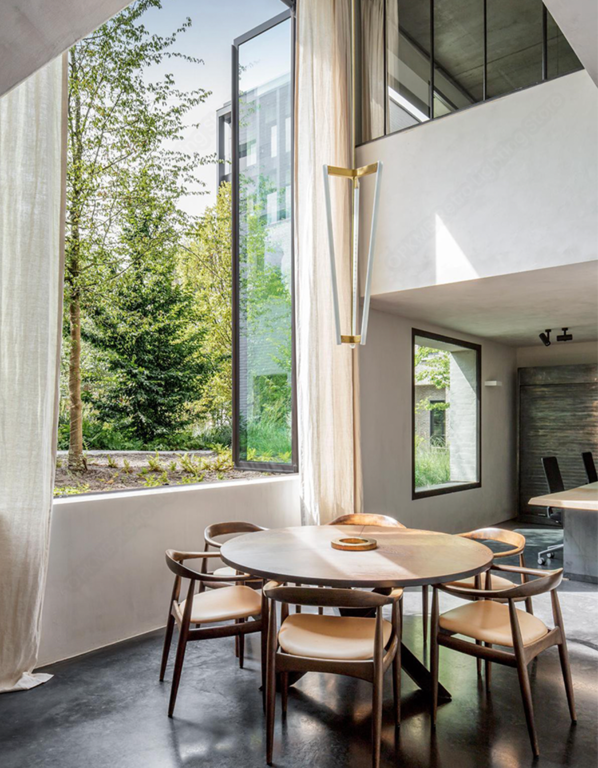 Tube chandelier installed above dining table in modern interior